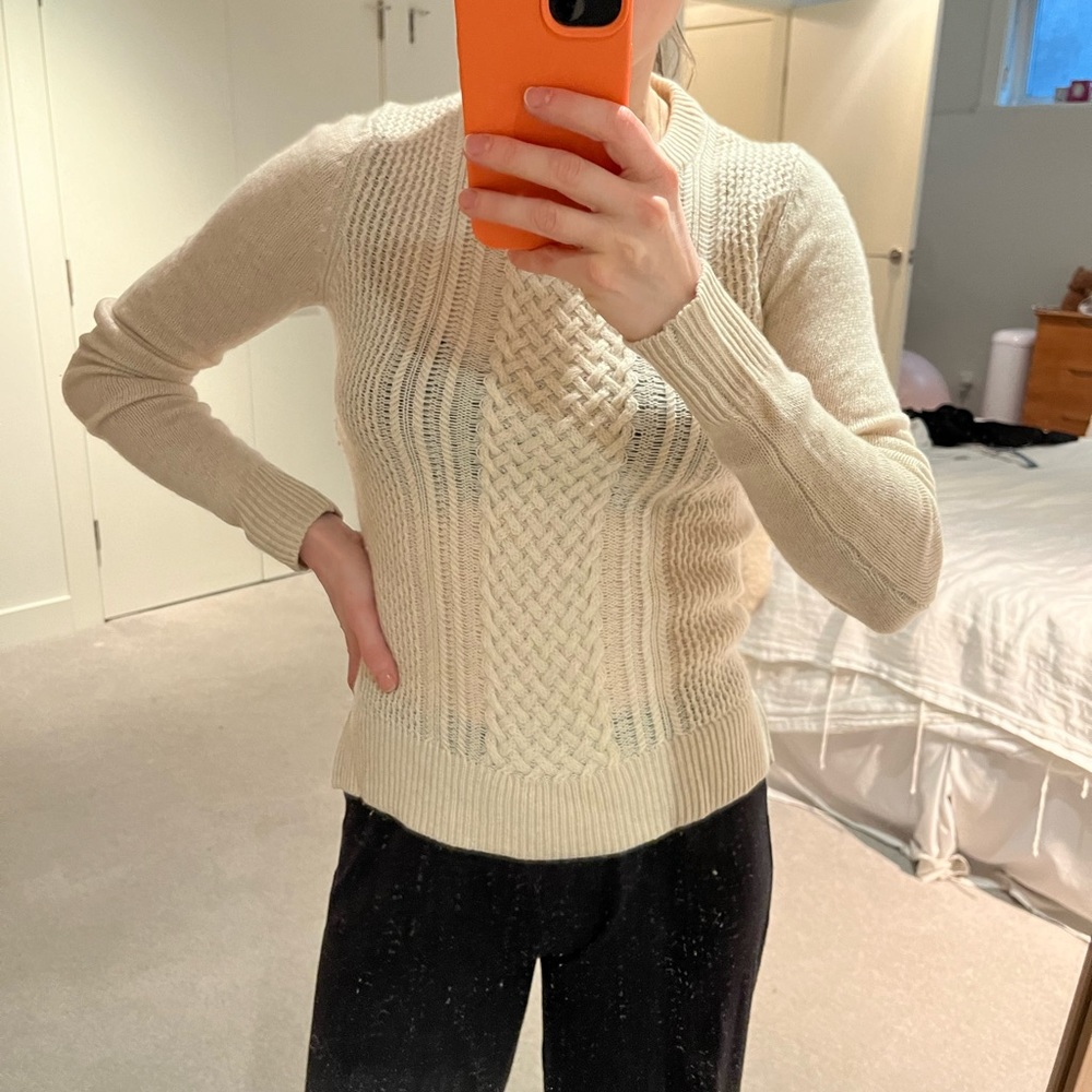 Cashmere and merino cable knit sweater.